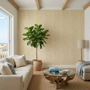 Living Room - Cozy living space with elegant 'String of Pearls' wallpaper in warm beige by York Wallcoverings.