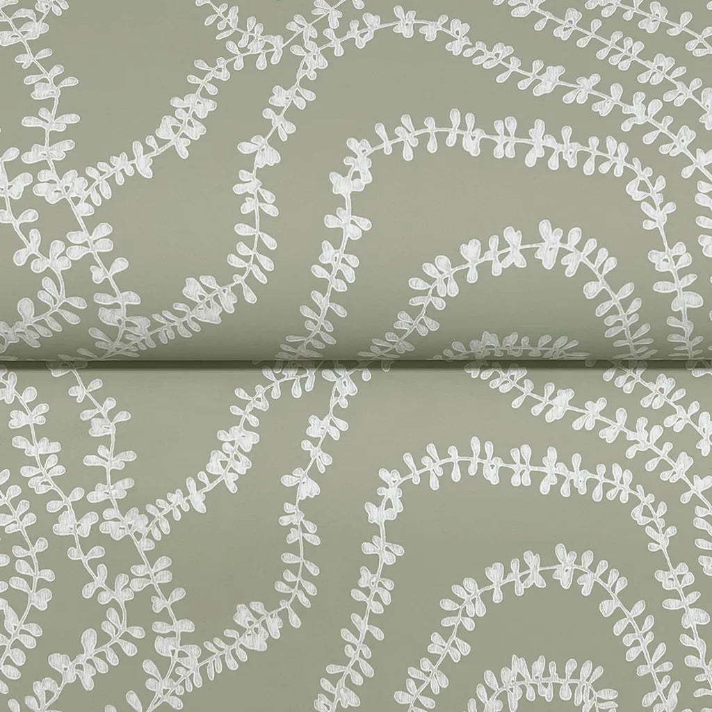 Detailed texture of York Wallcoverings' Sage Green 'String of Pearls' wallpaper.