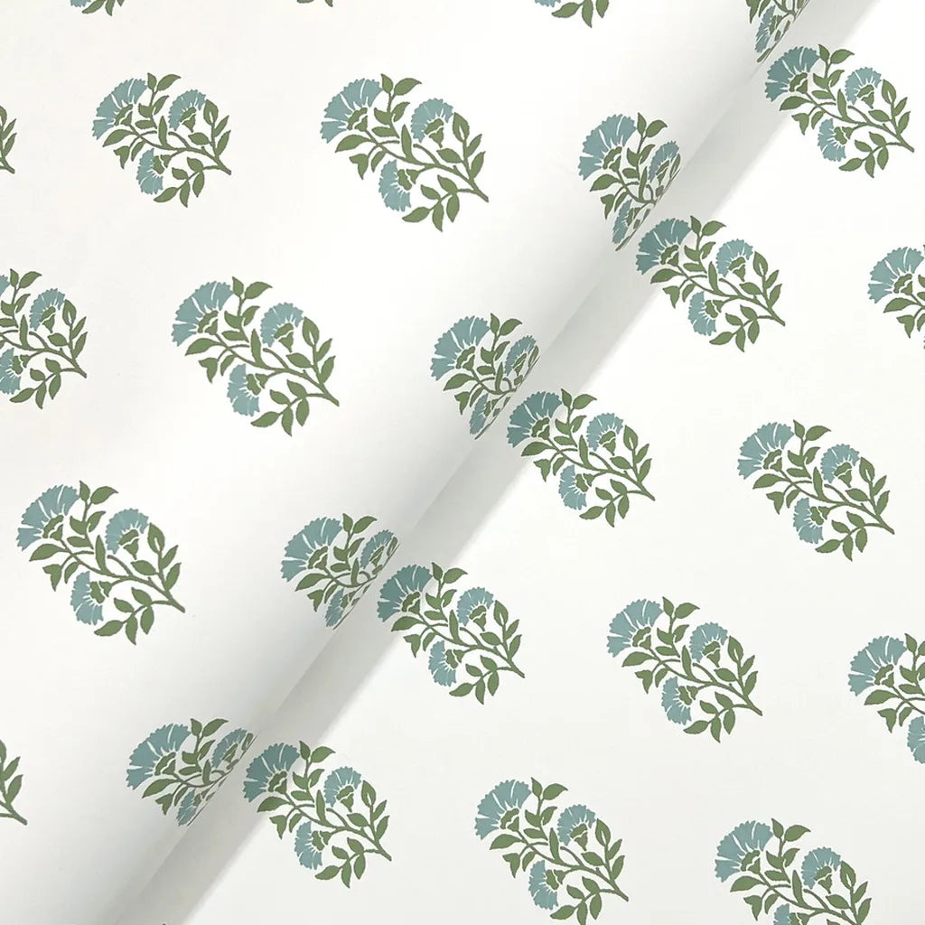 Close-up texture detail of York Wallcoverings' "Sylvie" wallpaper in Blue, Green, Cream, highlighting its intricate pattern.