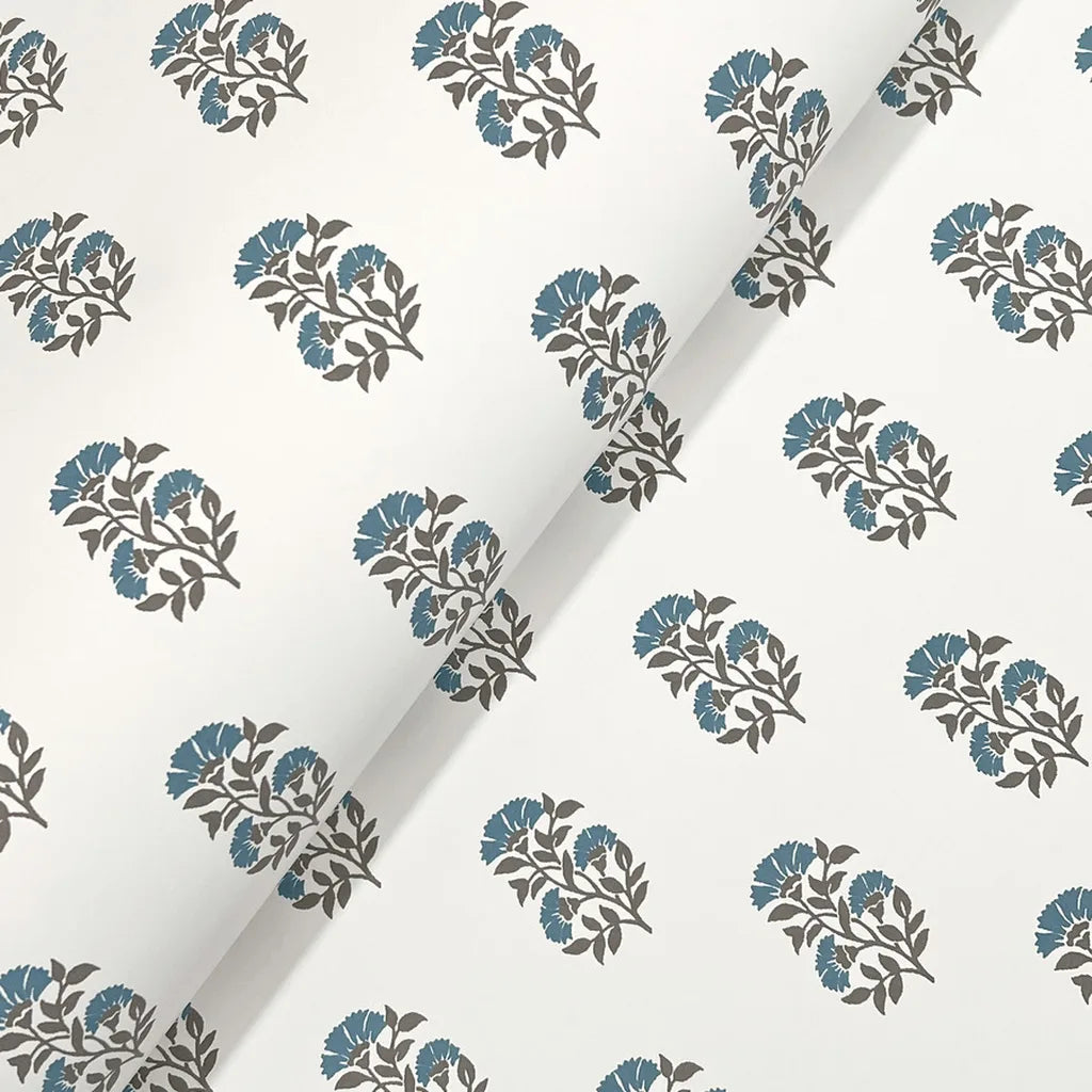 Close-up texture of Sylvie wallpaper by York Wallcoverings in elegant blue & cream, highlighting its intricate detail.