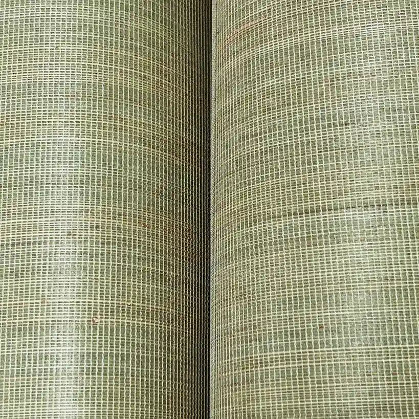 Close-up of Tailored Abaca wallpaper in Taupe by York Wallcoverings, showing its intricate natural woven texture detail.