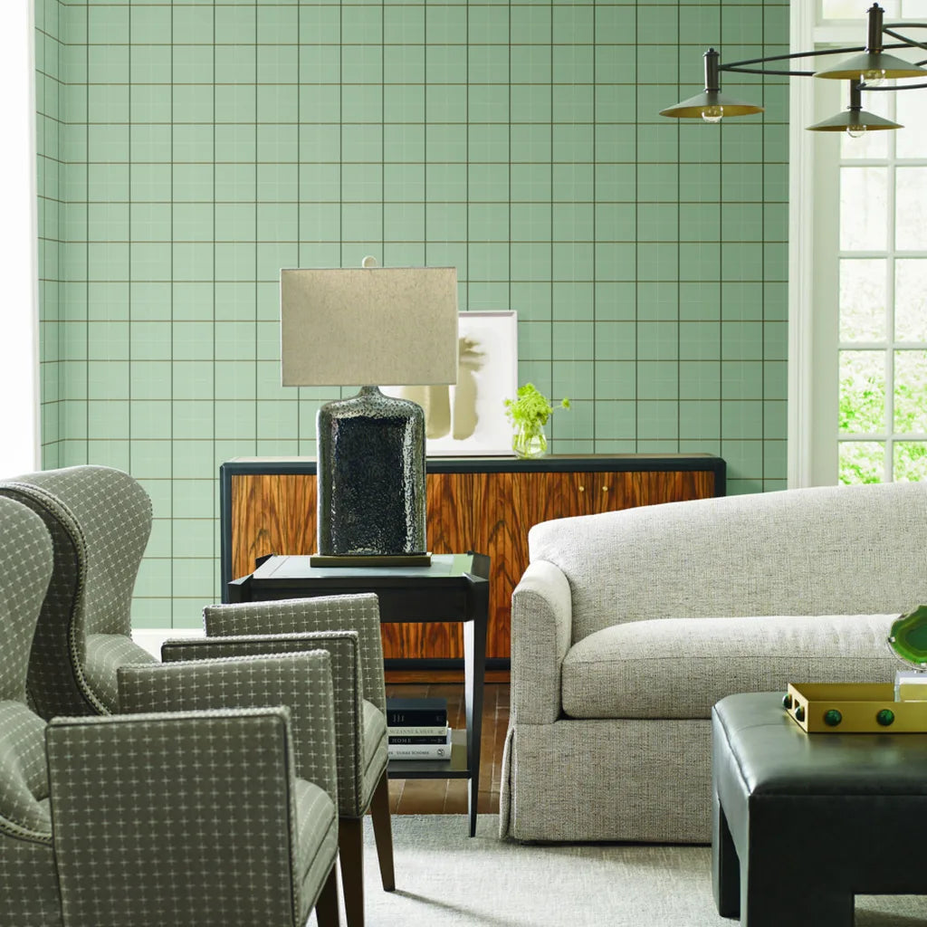 Living room showcasing elegant Tattersall wallpaper by York Wallcoverings in a sophisticated Sage Green and Brown pattern.