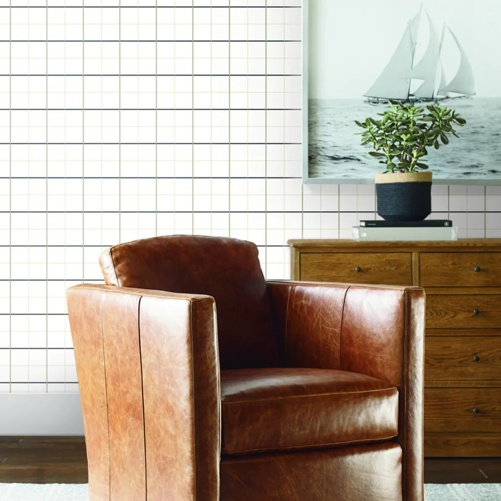 Living room with elegant Tattersall wallpaper by York Wallcoverings, featuring a sophisticated Charcoal and Taupe pattern.