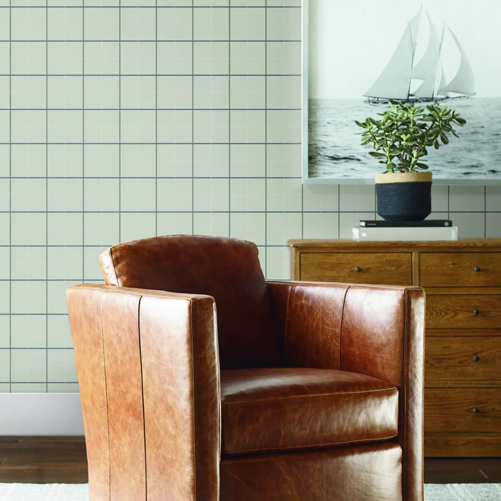 Living room with elegant Tattersall Light Greige wallpaper by York Wallcoverings, adding texture and warmth.