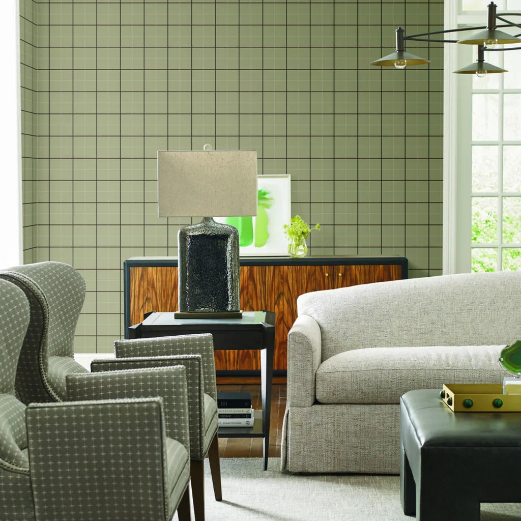 Cozy living room showcases elegant Tattersall wallpaper in Beige and Brown by York Wallcoverings, adding classic style and warmth.