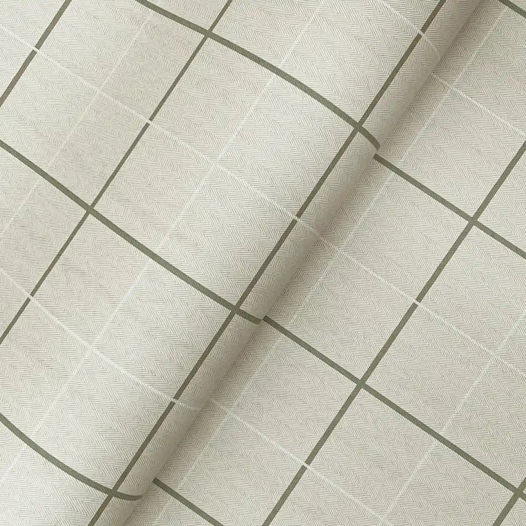 Close-up texture detail of Tattersall plaid wallpaper in beige and grey by York Wallcoverings, highlighting its intricate pattern.