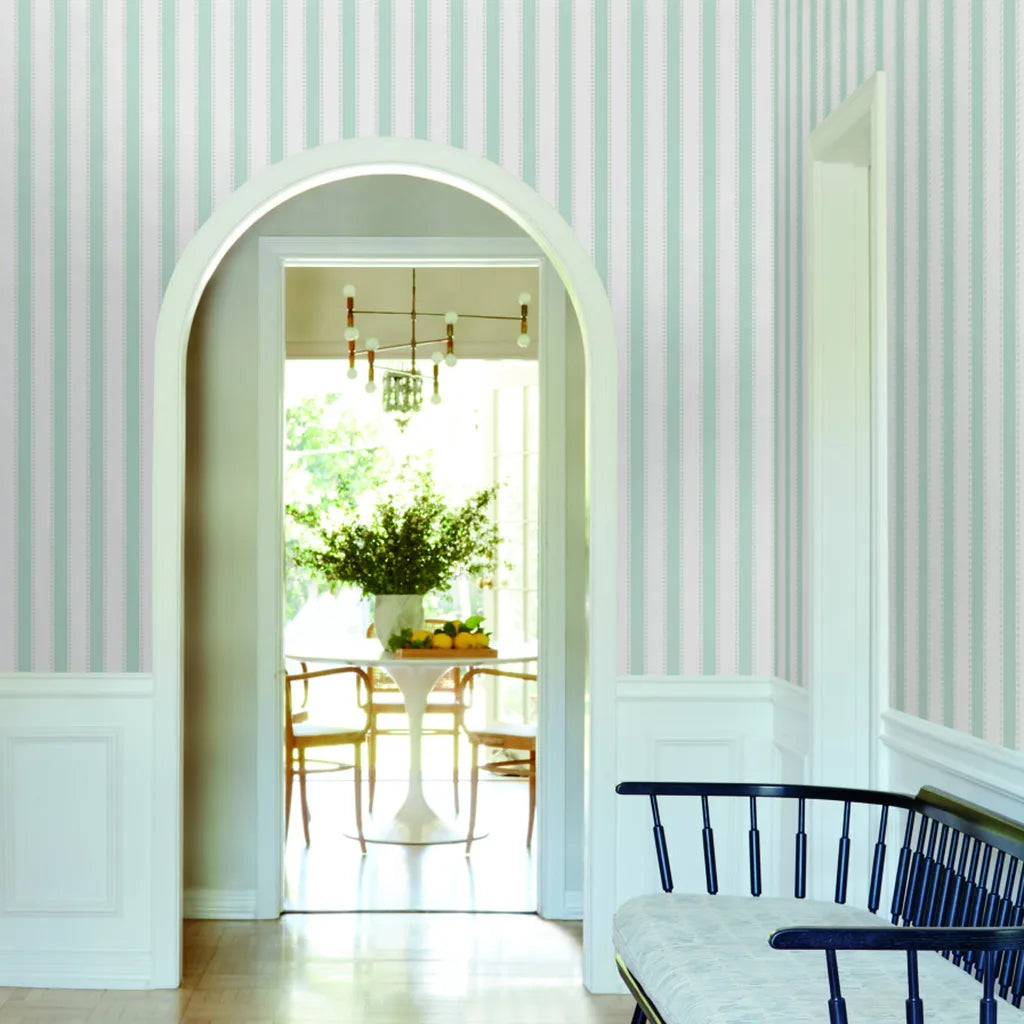 Bright entryway showcasing elegant Tilford Blue White wallpaper from York Wallcoverings for a welcoming first impression.
