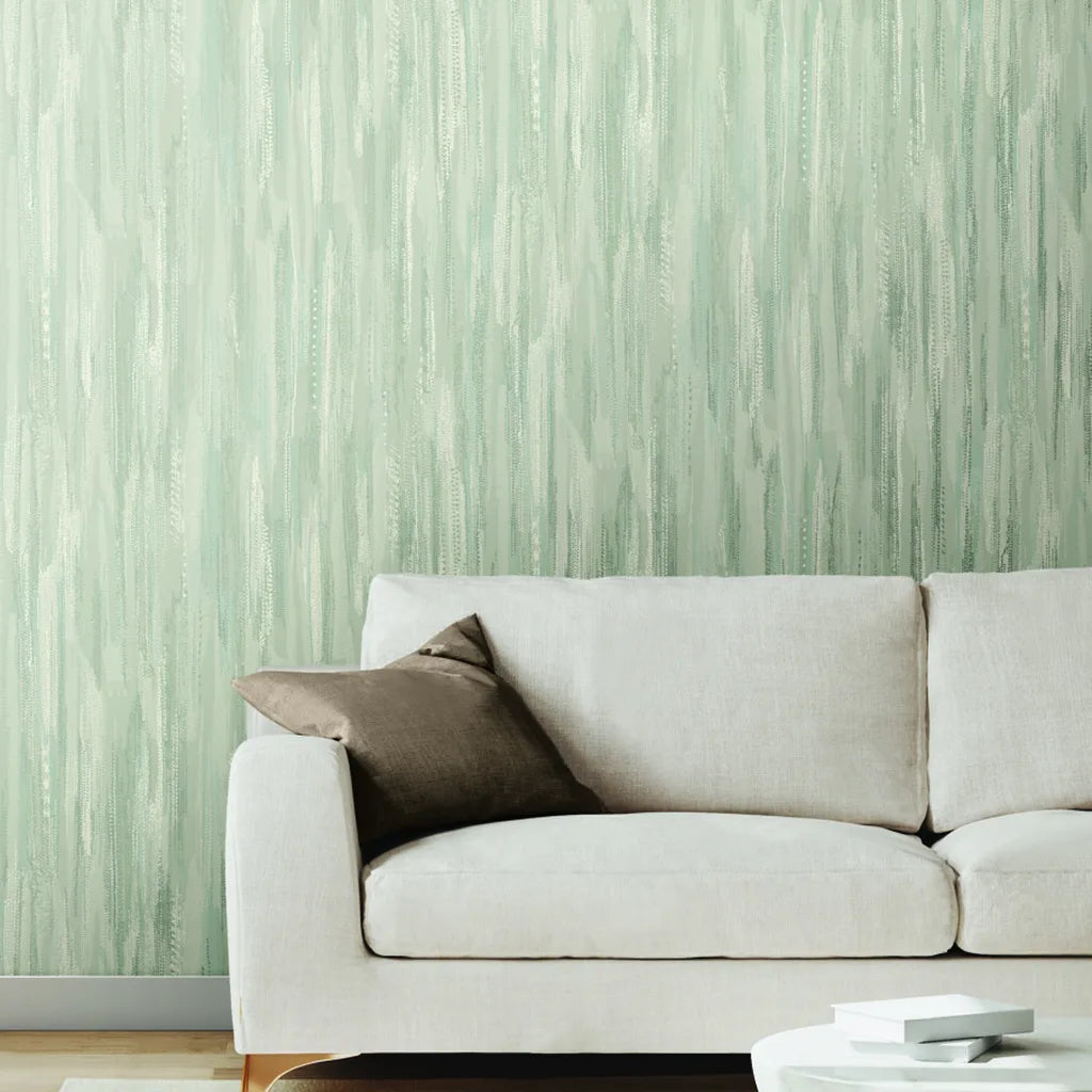 Living room showcases Tribeca wallpaper in Light Grey Blue by York Wallcoverings, creating a serene and stylish atmosphere.