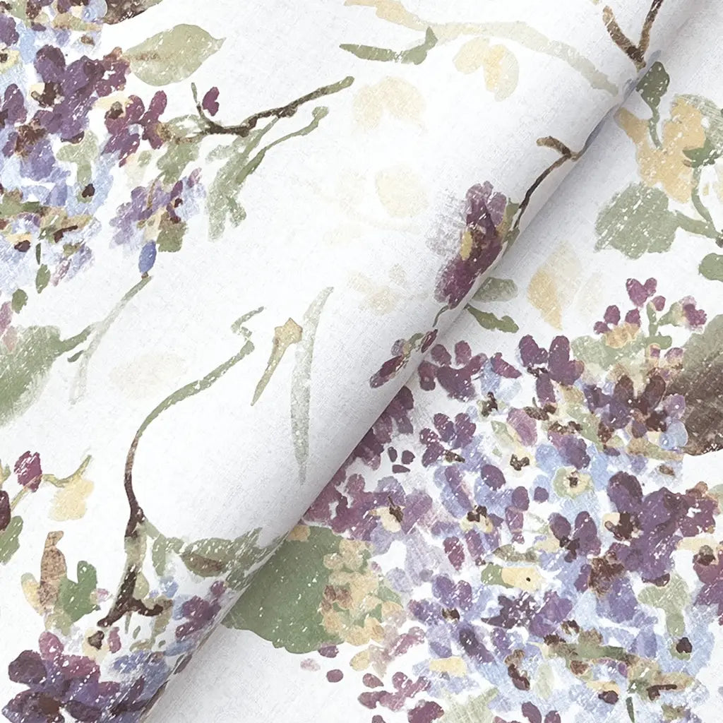 Intricate texture detail of York Wallcoverings' Veiled Garden wallpaper in Purple, Lavender, Yellow, Cream.