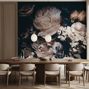 Dining Room - A dining room is adorned with a long wooden table, six chairs, and two round pendant lights, featuring premium decor. The serene oasis includes a dark mural of rose blooms and delicate branches from Decor2Go Wallpaper Mural's Bouquet of White Peonies Wallpaper Mural.