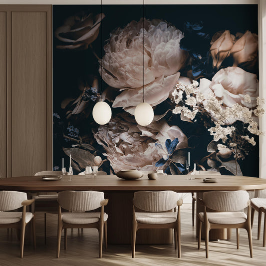 A dining room is adorned with a long wooden table, six chairs, and two round pendant lights, featuring premium decor. The serene oasis includes a dark mural of rose blooms and delicate branches from Decor2Go Wallpaper Mural's Bouquet of White Peonies Wallpaper Mural.