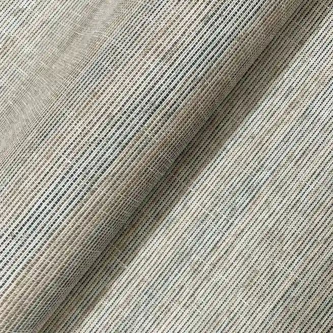 Close-up texture detail of Warwick wallpaper in Slate Blue Beige by York Wallcoverings.