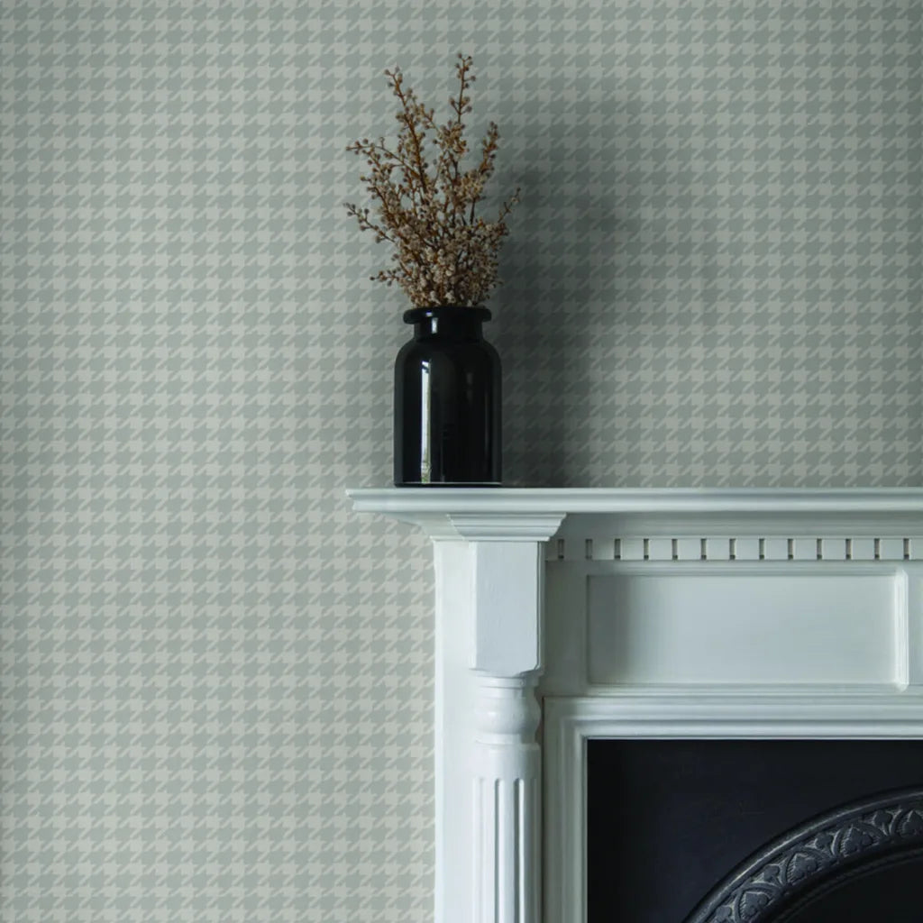 Modern living room features 'Watson' wallpaper in Light Greige by York Wallcoverings.