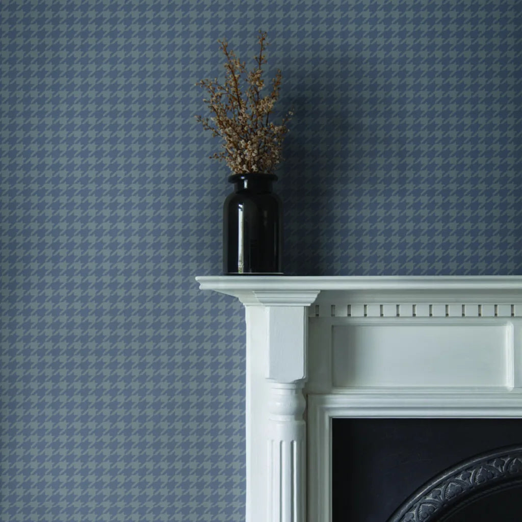 Watson wallpaper in Slate Blue by York Wallcoverings beautifully adorns this inviting interior space.