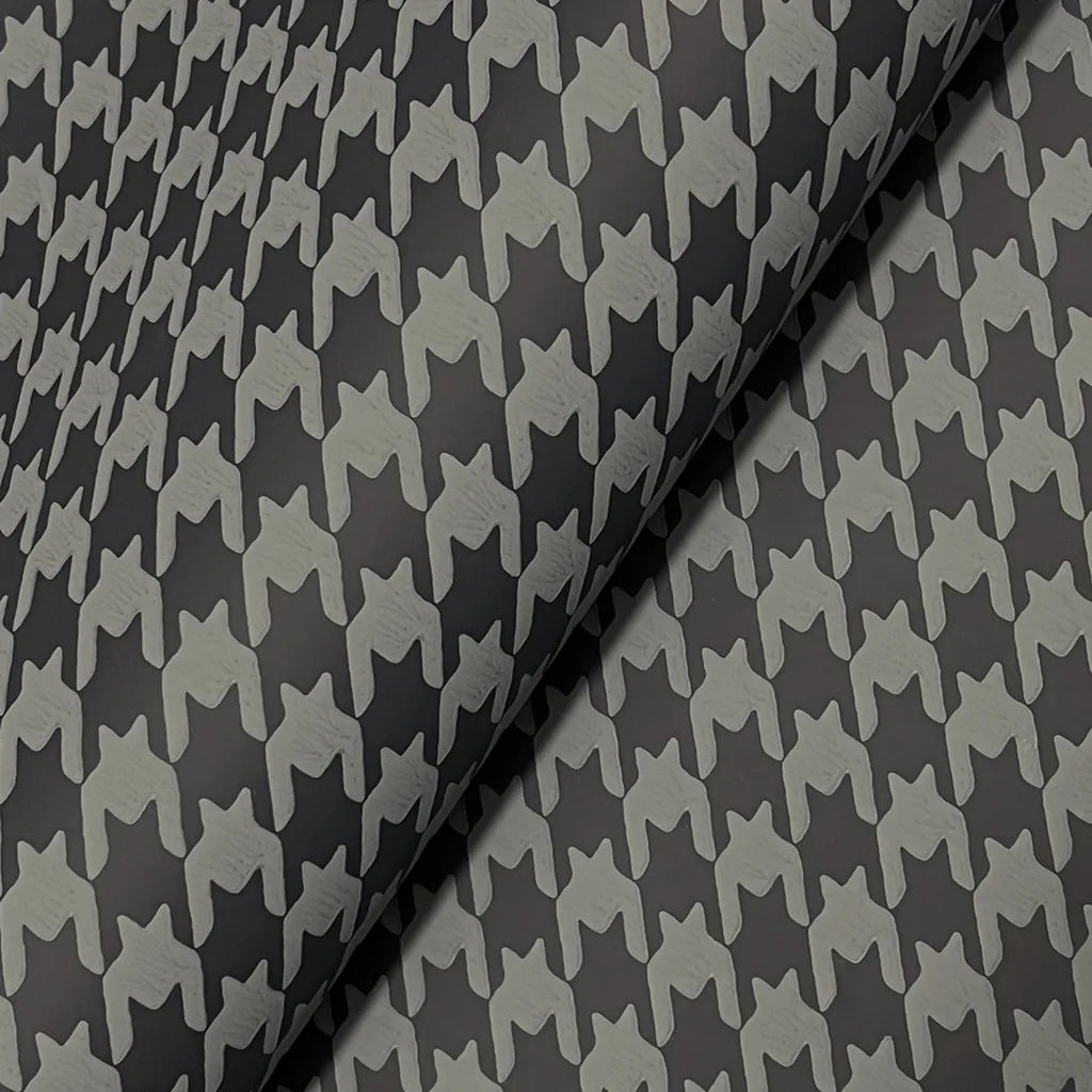 Close-up texture detail of Watson wallpaper in Charcoal and Taupe, showcasing the fine pattern by York Wallcoverings.