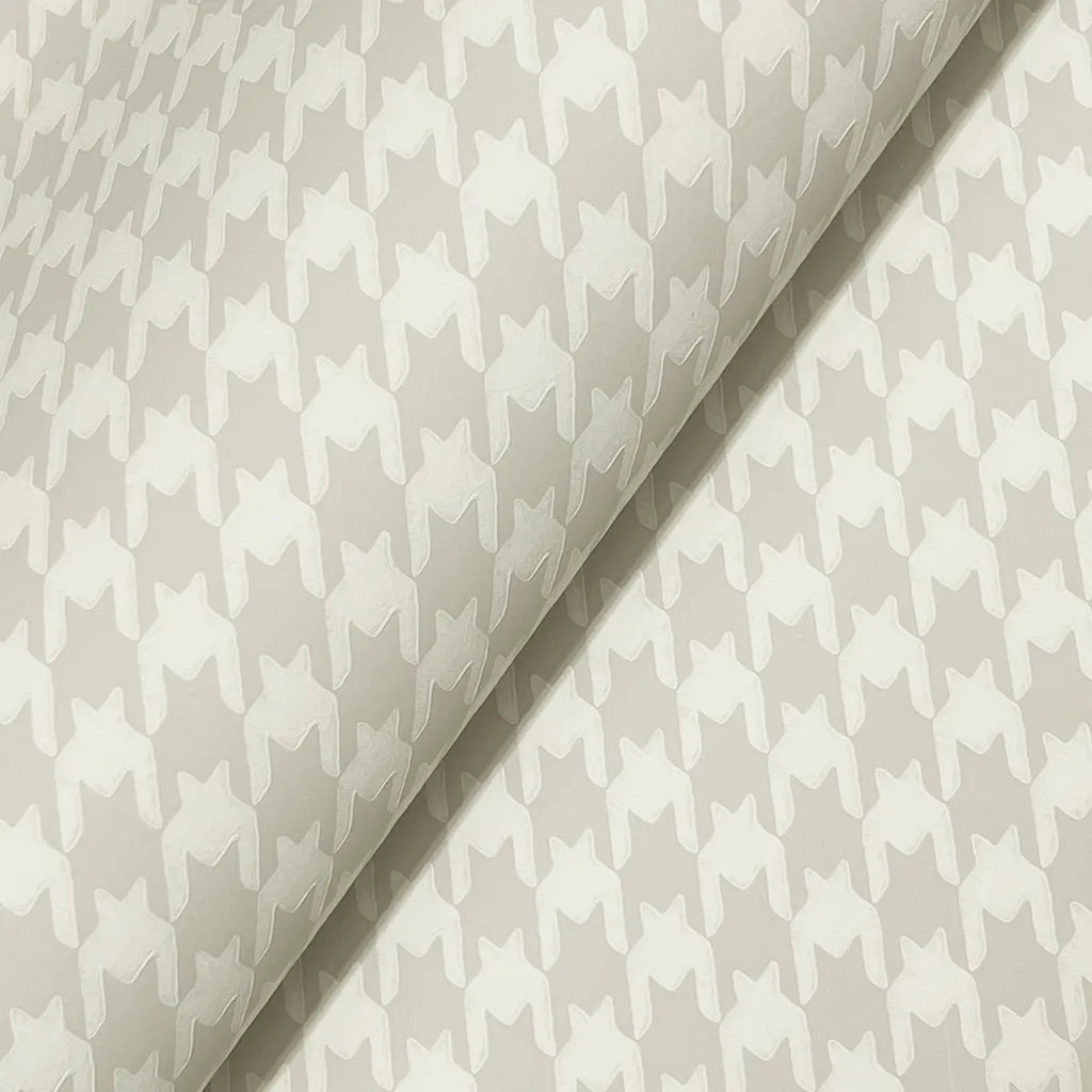 Close-up texture of Watson wallpaper in Warm Greige by York Wallcoverings, highlighting its subtle pattern.