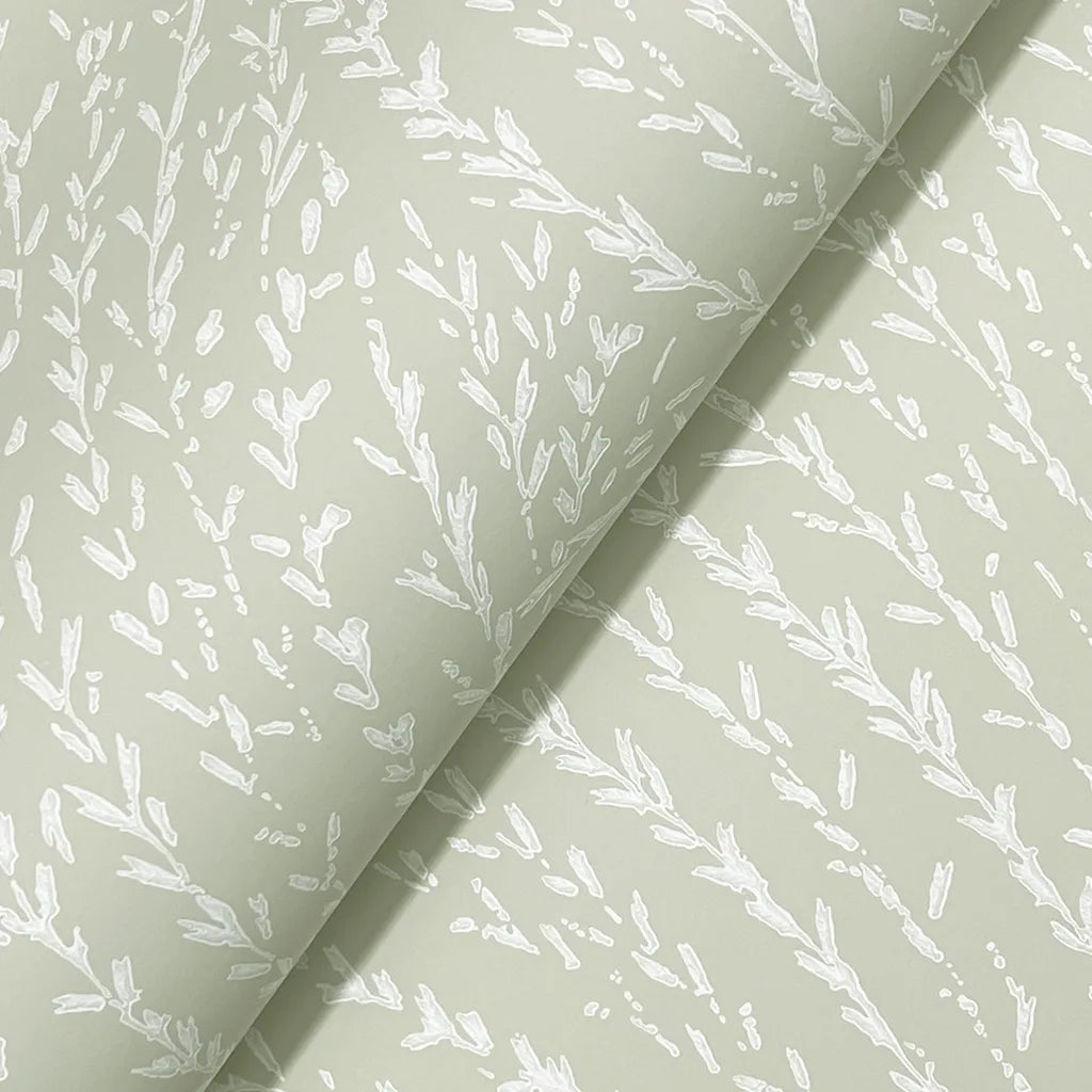 Close-up texture detail of Willow Song wallpaper in Sage and Cream by York Wallcoverings.