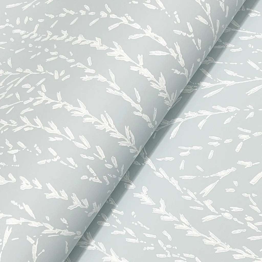Close-up texture of York Wallcoverings' Willow Song wallpaper in Mint Cream, highlighting intricate details.