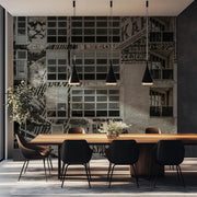 Dining room - Modern dining room with a long wooden table and black chairs against a textured wall.