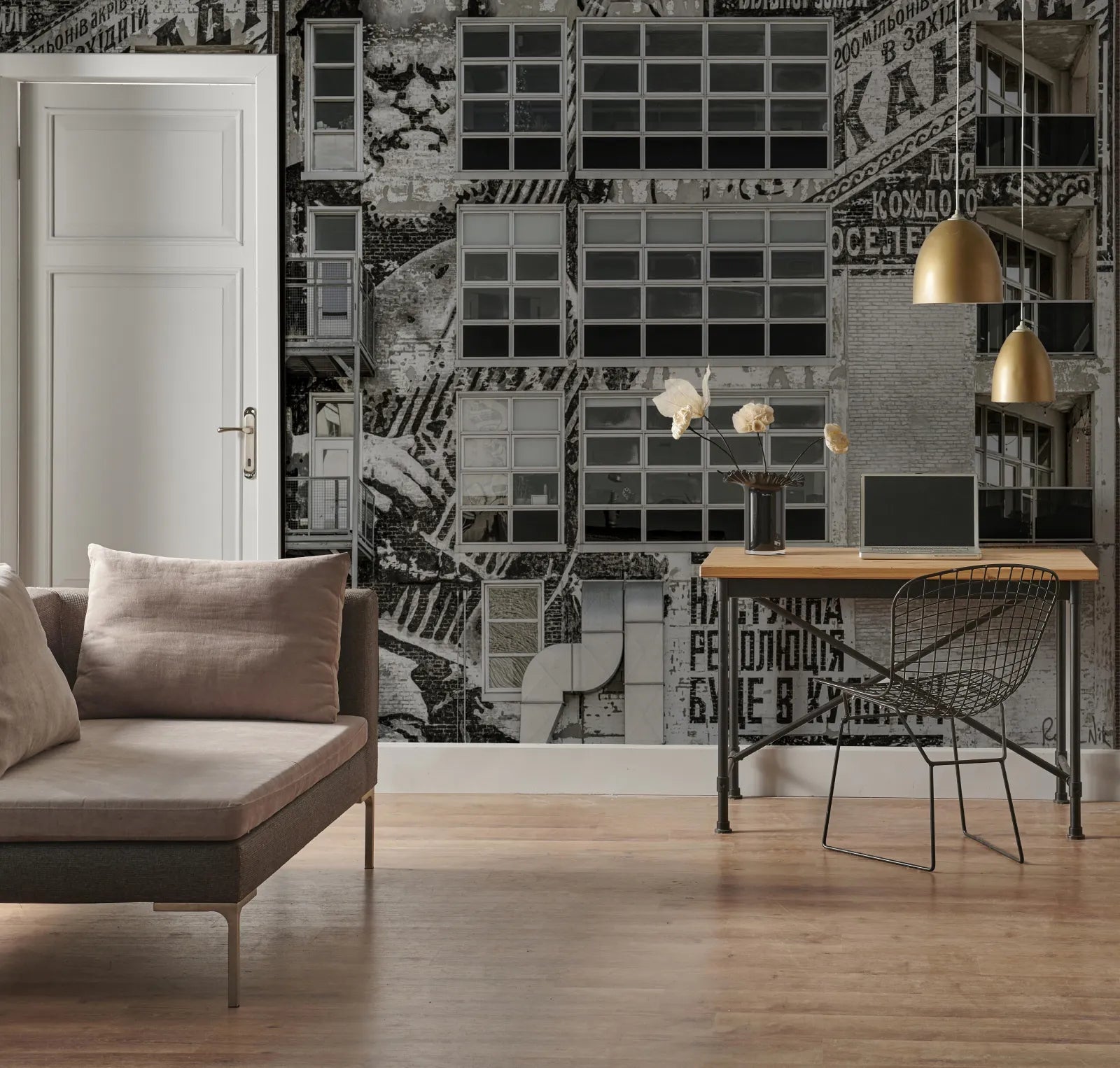 Living room - Modern living room with a sofa, coffee table, and decorative wall.