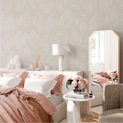 Bedroom - winter white leaves wallpaper mural with subtle palm leaf pattern in soft ivory and light greige