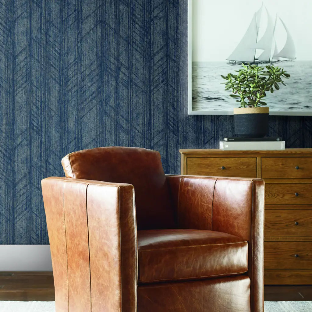 Living room showcasing elegant Navy Blue Winthrop wallpaper by York Wallcoverings, creating a sophisticated atmosphere.