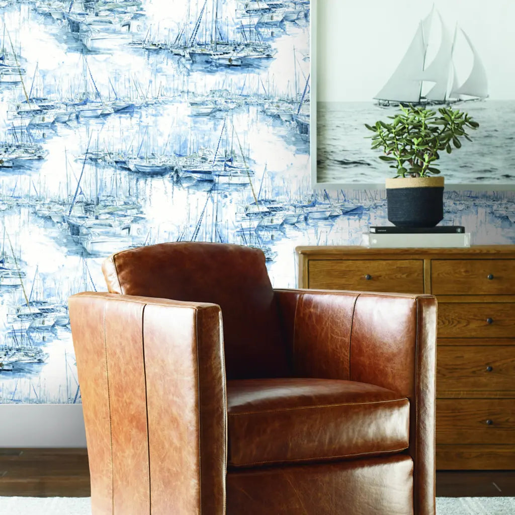 Elegant living room with Blue and White 'Yacht Club' wallpaper by York Wallcoverings, creating a serene coastal ambiance.