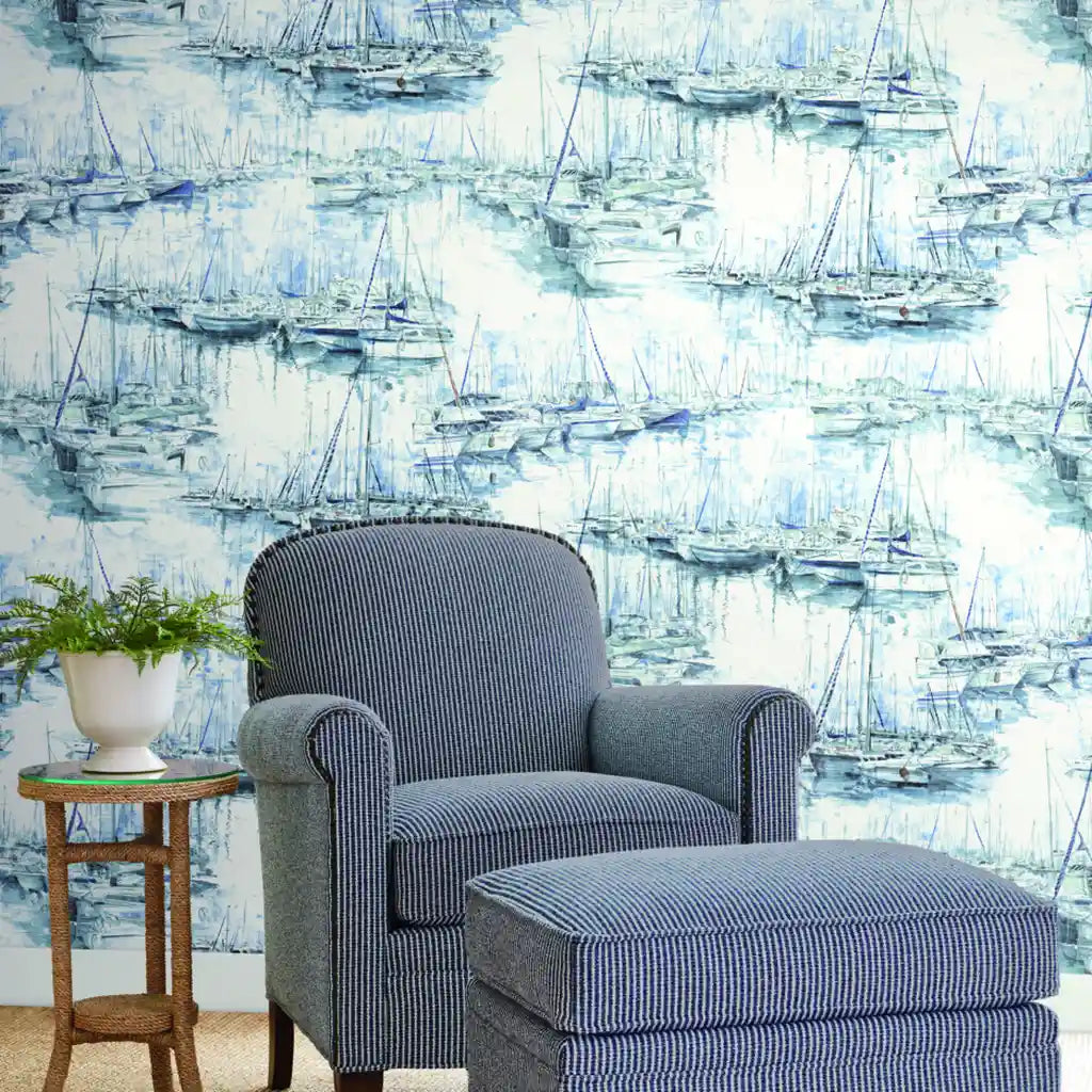 Elegant living room showcasing Blue and White 'Yacht Club' wallpaper by York Wallcoverings, creating a serene coastal ambiance.