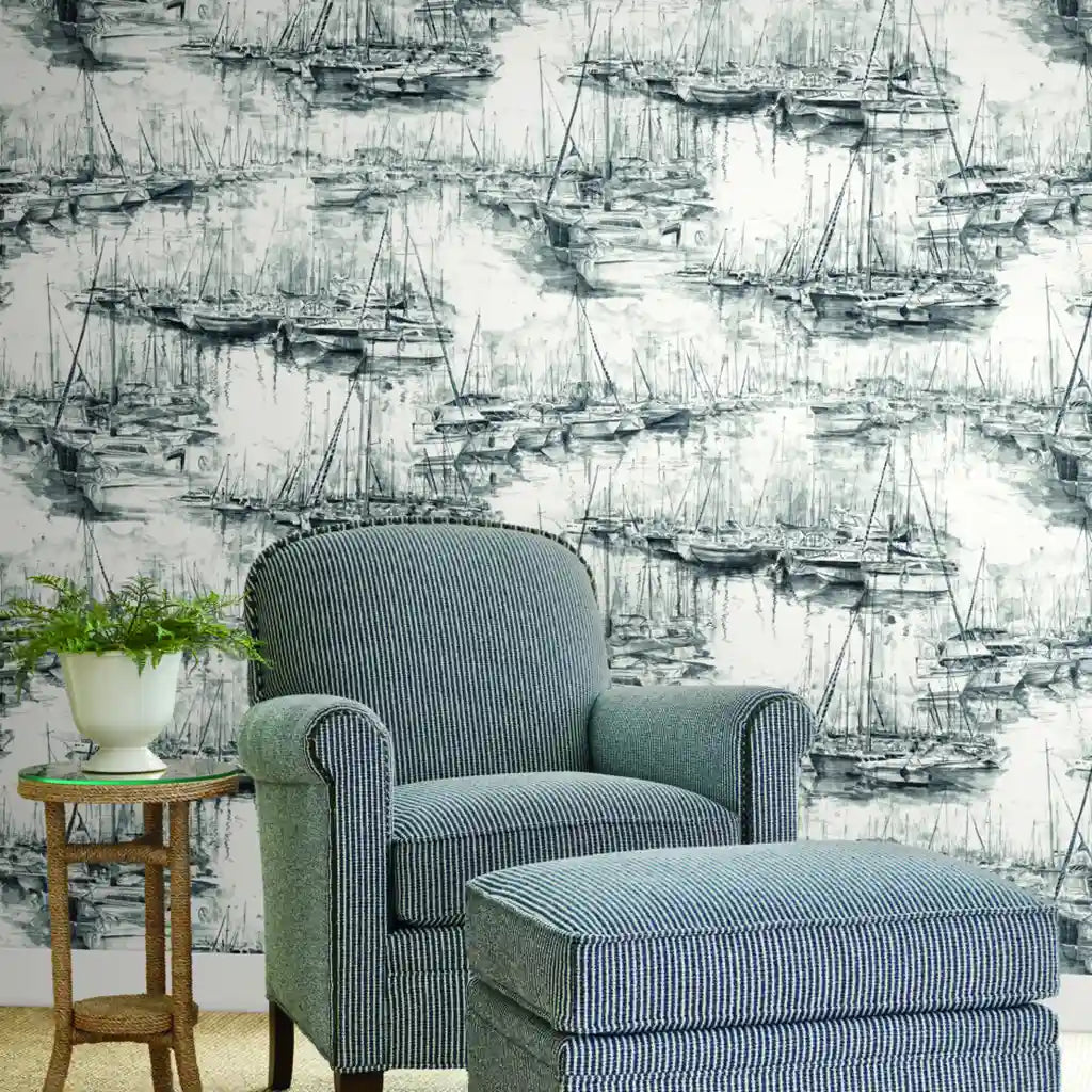 Modern living room with stunning Black and White 'Yacht Club' wallpaper by York Wallcoverings creating a chic nautical vibe.
