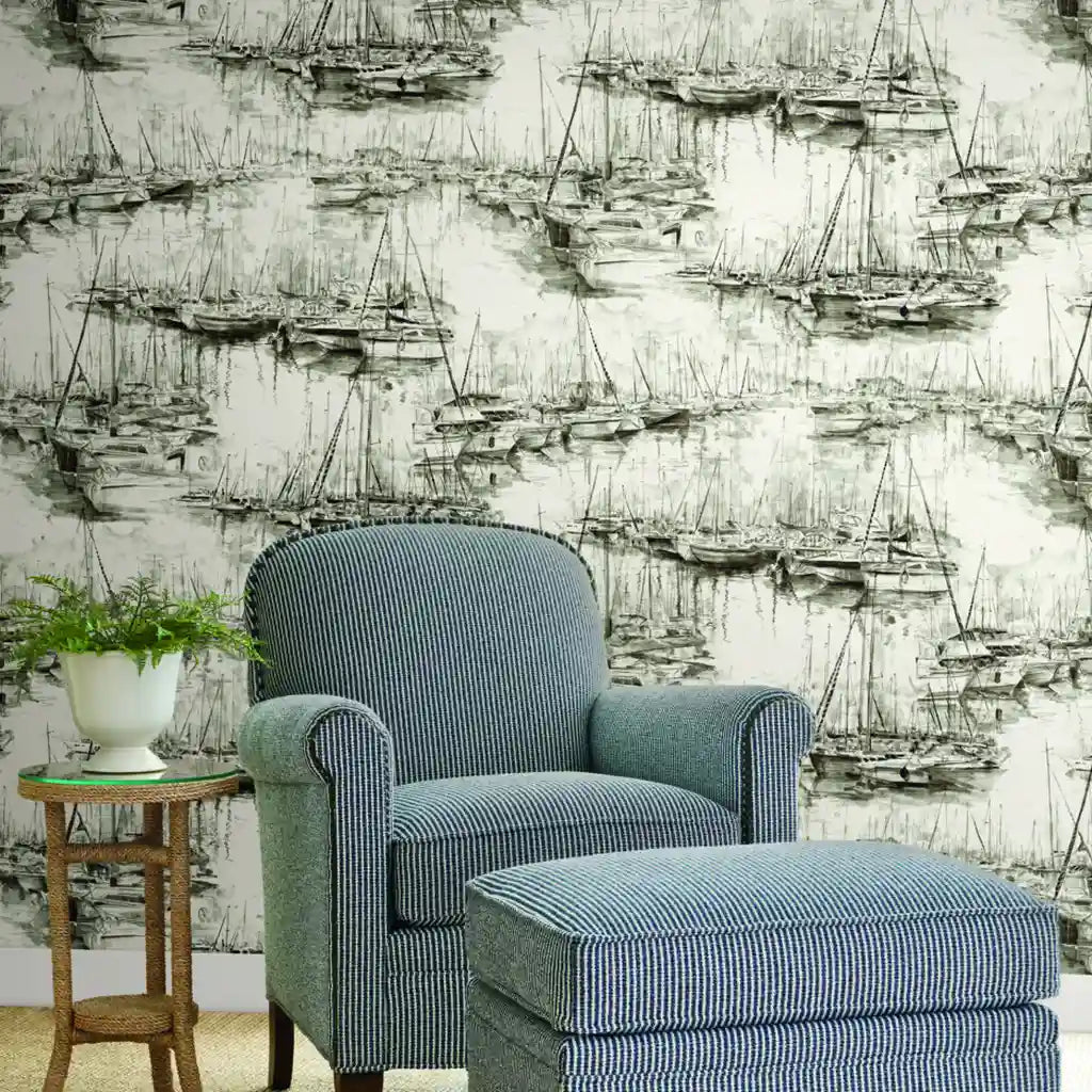 Modern living room features elegant Yacht Club wallpaper in Charcoal and Cream by York Wallcoverings, creating a sophisticated space.