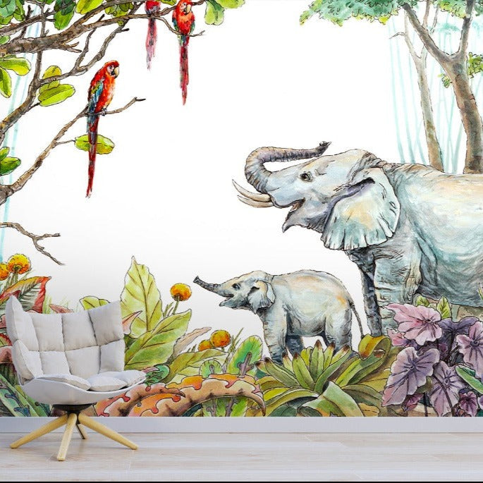 A vibrant Escape to the Jungle Wallpaper Mural from Decor2Go covers a wall in a room, featuring a large elephant and its calf amid lush greens and colorful flowers, with parrots overhead. A cozy white chair sits in front of the mural.