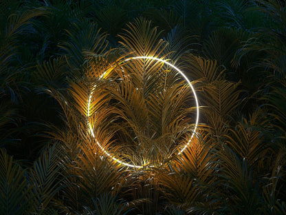 A Decor2Go Wallpaper Mural featuring Big Green Leaves with Ring Light wallpaper mural is positioned among dense tropical foliage, illuminating the fronds with a warm, golden glow against a dark background.