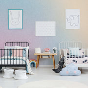 Kids Room - A colorful children's room with two metal-frame beds, animal-themed wall art, a small desk with books, decorative plants, and a cloud-shaped pillow on the floor featuring Decor2Go Wallpaper Mural.