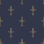 A York Wallcoverings Fleur De Lis Wallpaper (60 SqFt) featuring a dark blue background with a repeating gold fleur-de-lis pattern. The evenly spaced fleur-de-lis symbols have a slightly textured, worn appearance, adding a vintage touch to the scrubbable design.